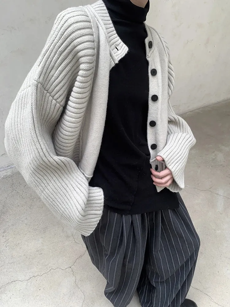 Oversized Knit Cardigan with Contrasting Patterns